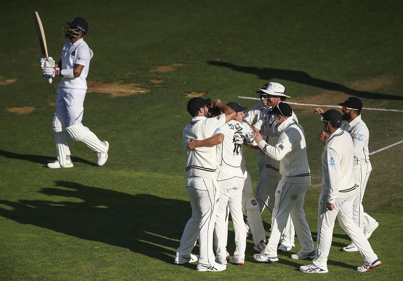 Virat Kohli walks back to the pavillion